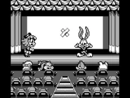 Elmyra prepares to chase Buster after he completes a stage