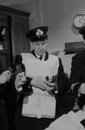 Herbert Pitman receiving the firearms from Chief Officer Wilde in A Night to Remember (1958)