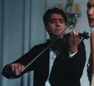 Wallace Hartley in the We're Good music video by Dua Lipa