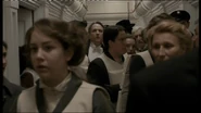 Crowded First Class corridor.
