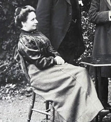 Jessie Leitch sitting in the Harper family's guarden.
