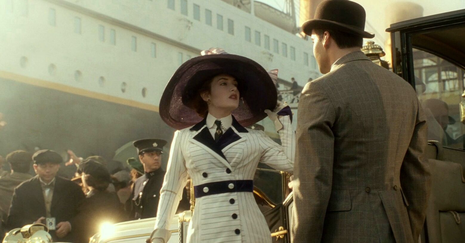 Rose DeWitt Bukater boarding the Titanic..oh the hat, how I love the hat
