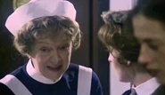 Madge Ryan as Violet Jessop in S.O.S. Titanic