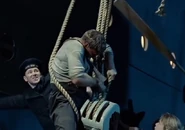 Frederick Barrett tries to free lifeboat 13 from the falls in Titanic (1997)