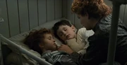 Irish Little Boy and his  sleeping while their mother telling them the tale of Tír Na Nóg
