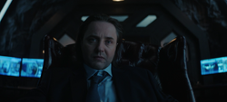 Jonathan Crane listens to Batman's dossier on him