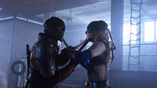 Rose trains with her father.