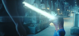 Aqualad blocks Dr. Light's attack