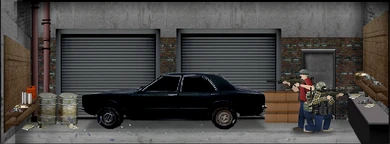 Interior of the garage (note the black muscle car)