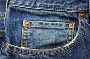 A pocket on a pair of blue jeans in real life.