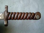 A hilt from a sword in real life.