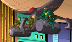 Michelangelo on the Turtle Blimp along with his 2003 counterpart and Raphael