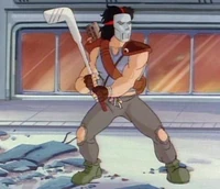 Casey Jones fighting with an ice hockey stick.