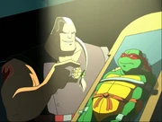 Hun holds Raph captive