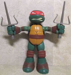 https://static.wikia.nocookie.net/tmnt/images/f/fc/Stretch-N-Shout-Raphael-2014.JPG/revision/latest/scale-to-width-down/250?cb=20220707172933