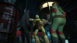Donnie punching the dummy