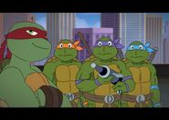 2012 Raph mocks the 1987 Turtles for having initials on their belt buckles.