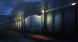 Musujime standing outside the Reformatory