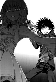 Touma threatening Leivinia with a power drill.