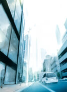 A scenery of Academy City appears in title-page illustration of volume 12. Looking at the car on the street, or the person walking, its basically the atmosphere of the general public in a city street. However, instead of a streetlight, it is naturally the wind turbine that's been built instead, highlighting the different nature of Academy City.