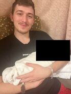 Rhett with his daughter, sporting the same bracelet that he wore to the sting.