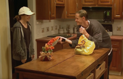 John Dupee bearing gifts (Snapple, Cheetos, and dark chocolate).
