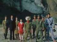 From the left to right: Chie Sahara, Dr. Sahara, Member Ono, Rumi Sahara, Saburo Minami, Member Muranaka, Captain Kenmochi, Member Umino and Gantetsu (disguises as a Brain Party grunt)
