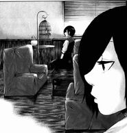 Touka junto a Loser.