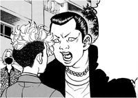 Chifuyu confronted by a gang member
