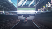 Takemichi about to get hit by a train (anime)