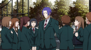 Tsukiyama surrounded by admirers.