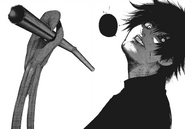 Sasaki shapes his kagune into a skeletal hand.