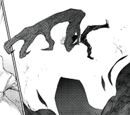 Sasaki shapes his kagune into a three-fingered claw.