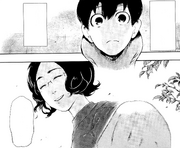 Young Kaneki with his mother