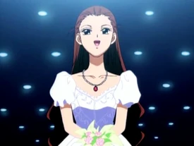 Tsukiko/Gretchen modeling the Rainbow Stone necklace at the end episode 24.
