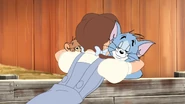 Dorothy hugging Tom and Jerry