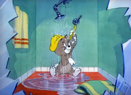 Topsy faking a shower.