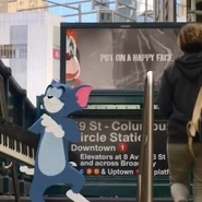 Droopy on the billposter as the Joker from batman.