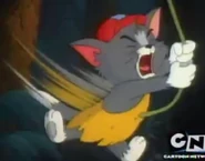 Tom Jungle Toga.png (253 KB) Tom wearing a yellowish jungle toga