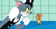 Tom about to make Jerry pay