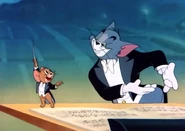 Tom offering Jerry to dance again