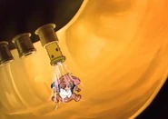 Jerry inside the tuba getting squirted by a note