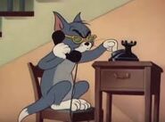 Tom using the phone (Jerry's Cousin)