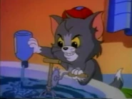 Tom pouring bubble bath