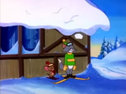 Tom and Jerry by the snow cabin.