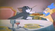 Toots in Mouse Comes to Dinner Toots offering Tom sandwichs