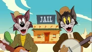 Meathead and Butch in Wild West outfits and singing in Ballad Of The Catnip Kid