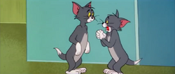George tells Tom that Jerry was scaring him.png