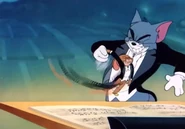Tom hurling Jerry in circles
