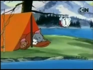 Tom and Jerry sleeping in a tent